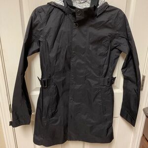 REI black nylon jacket with attached hood.  Size XS.  EUC